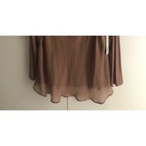 Soft surrounding top. Brand new!